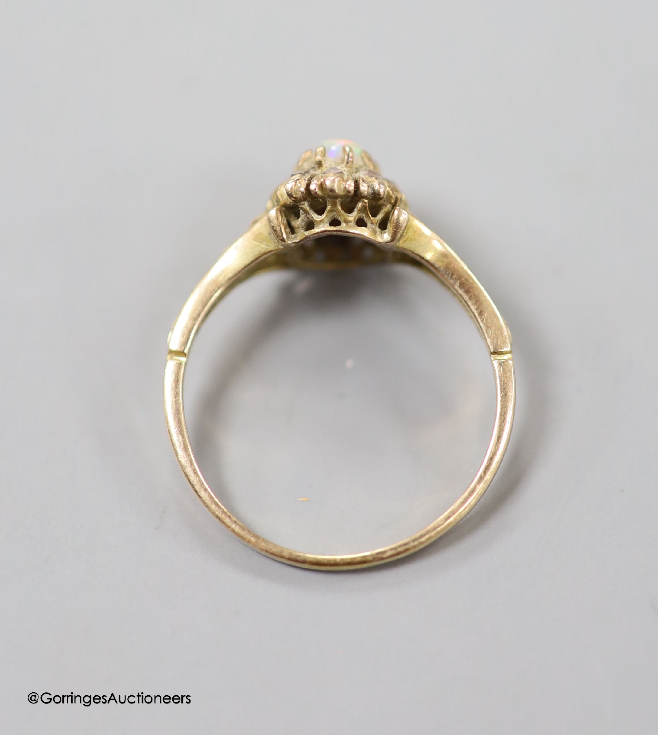 An early 20th century Austro Hungarian? yellow metal, opal and rose cut diamond set oval dress ring, size P, 2.7 grams.